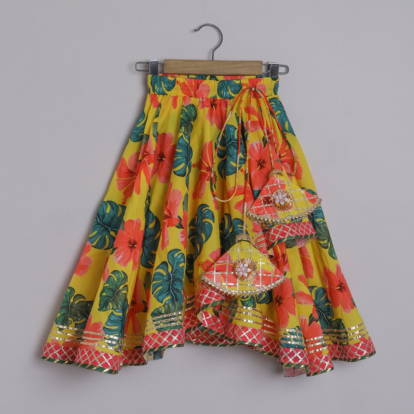 Girls Elegant Hibiscus Printed Yellow Cotton Top And Asymmetric Lehenga