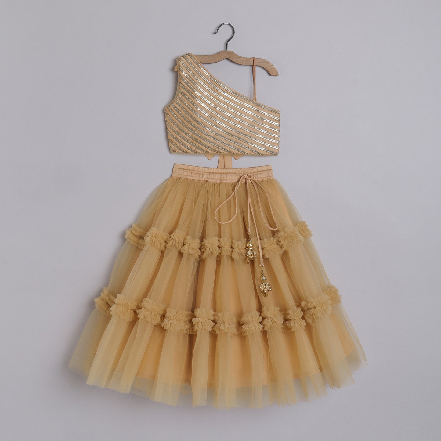 Girls Embroidered Beige One Shoulder Top And Ruffle Lehenga